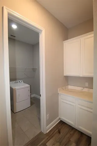 a room with a washer and dryer