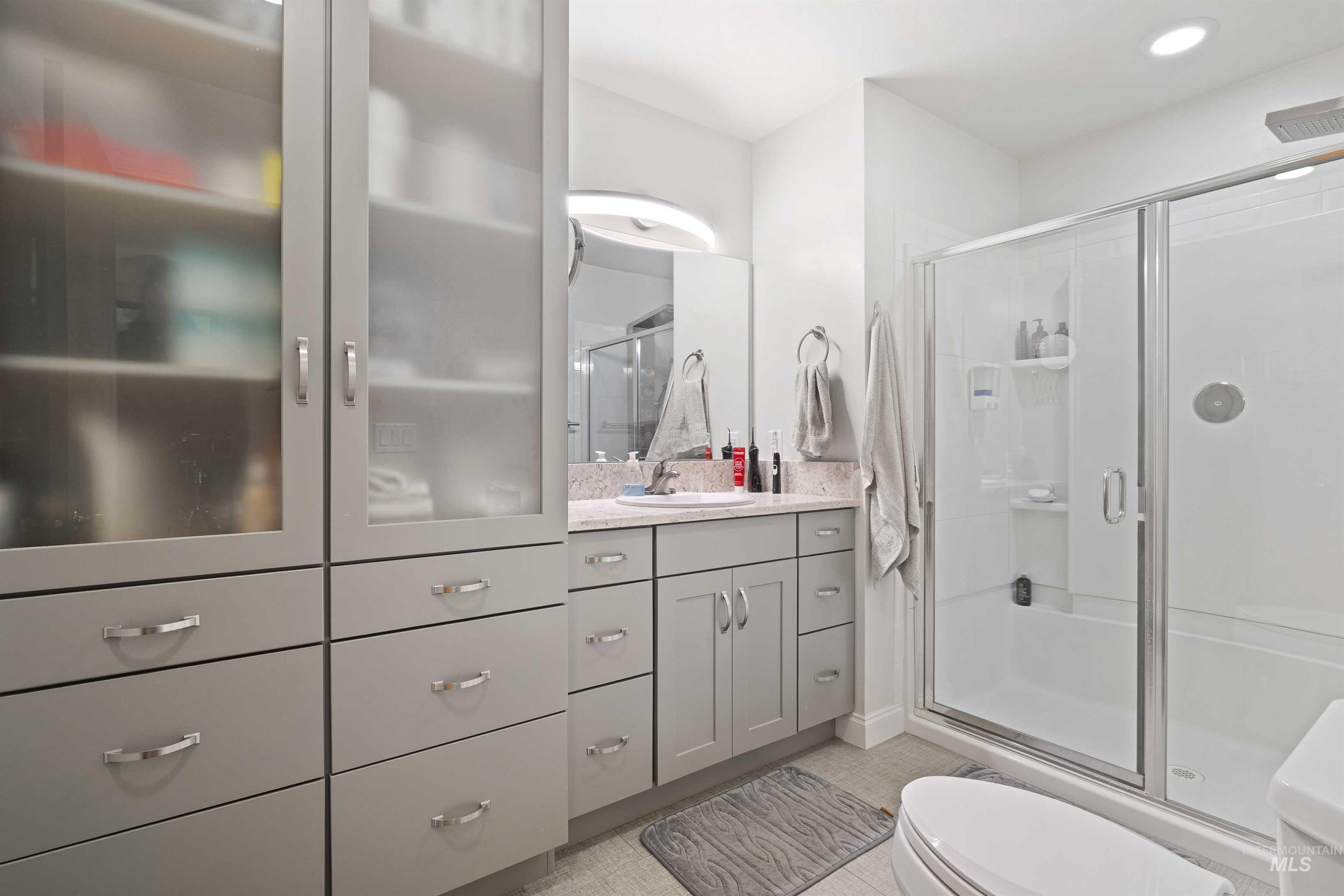 430 Pierce Street Twin Falls, ID 83301 - Photo 18 of 39 Bathroom featuring vanity and a shower stall
