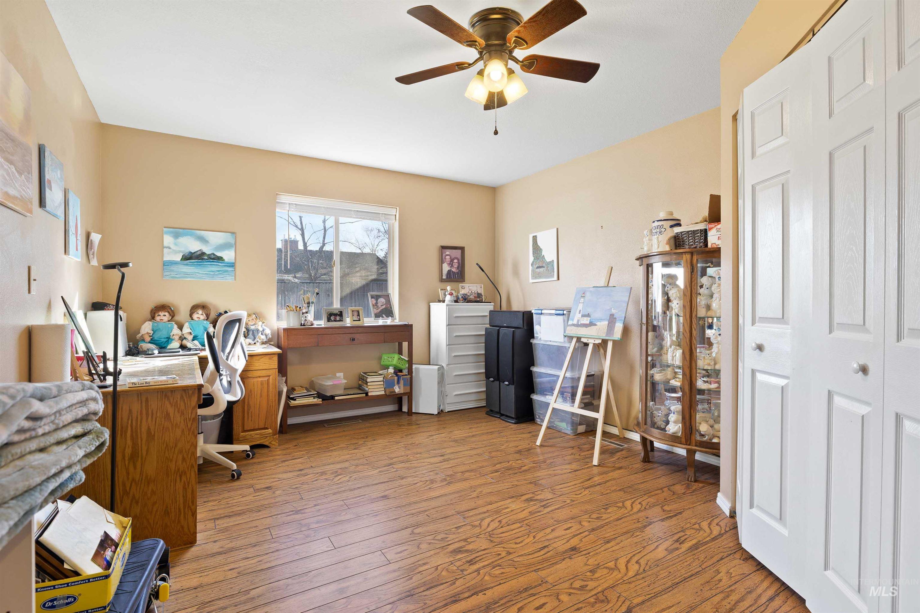 430 Pierce Street Twin Falls, ID 83301 - Photo 19 of 39 Home office with hardwood / wood-style floors and a ceiling fan