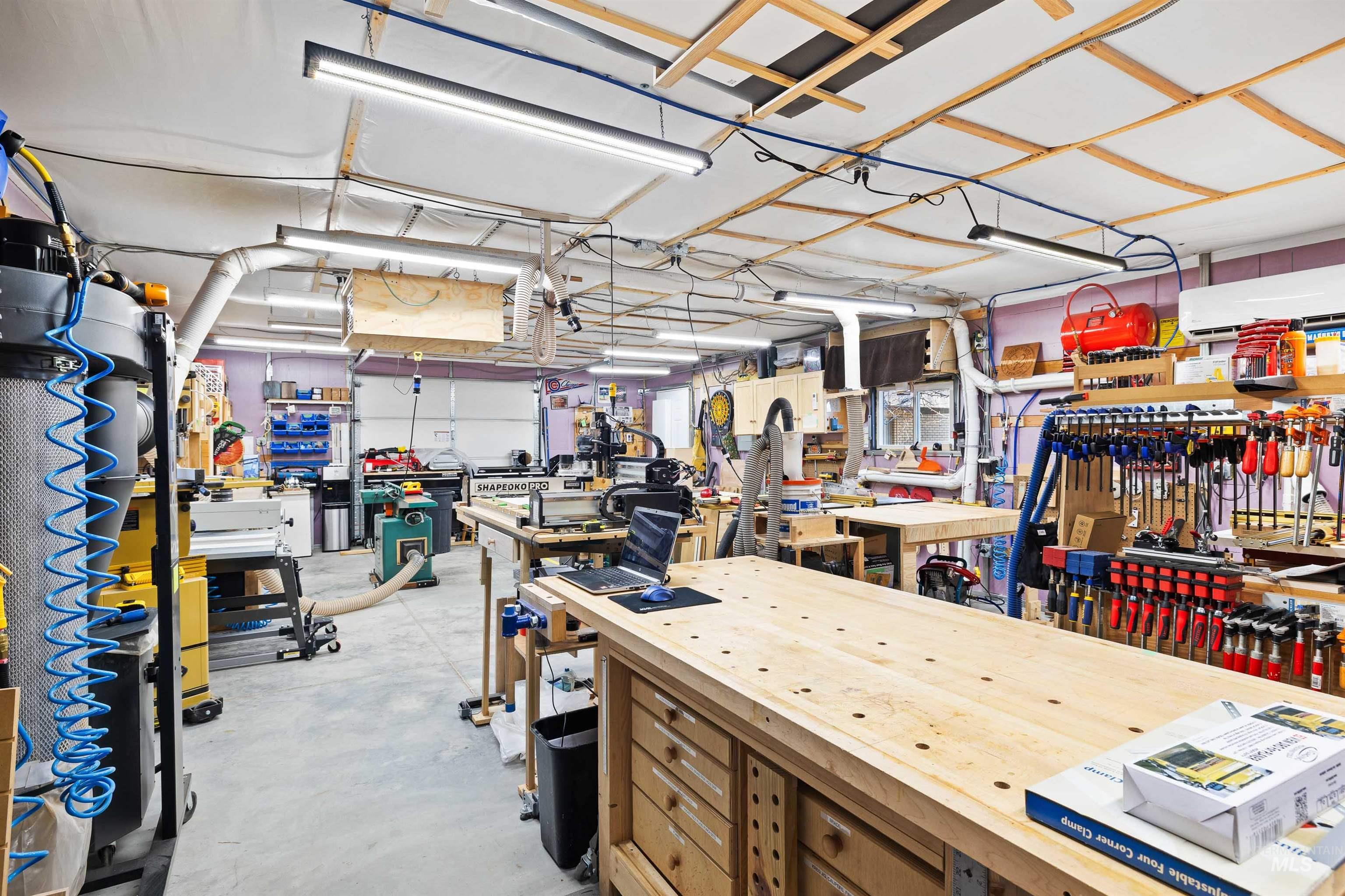 430 Pierce Street Twin Falls, ID 83301 - Photo 24 of 39 Miscellaneous room with concrete flooring and a wall mounted mini split