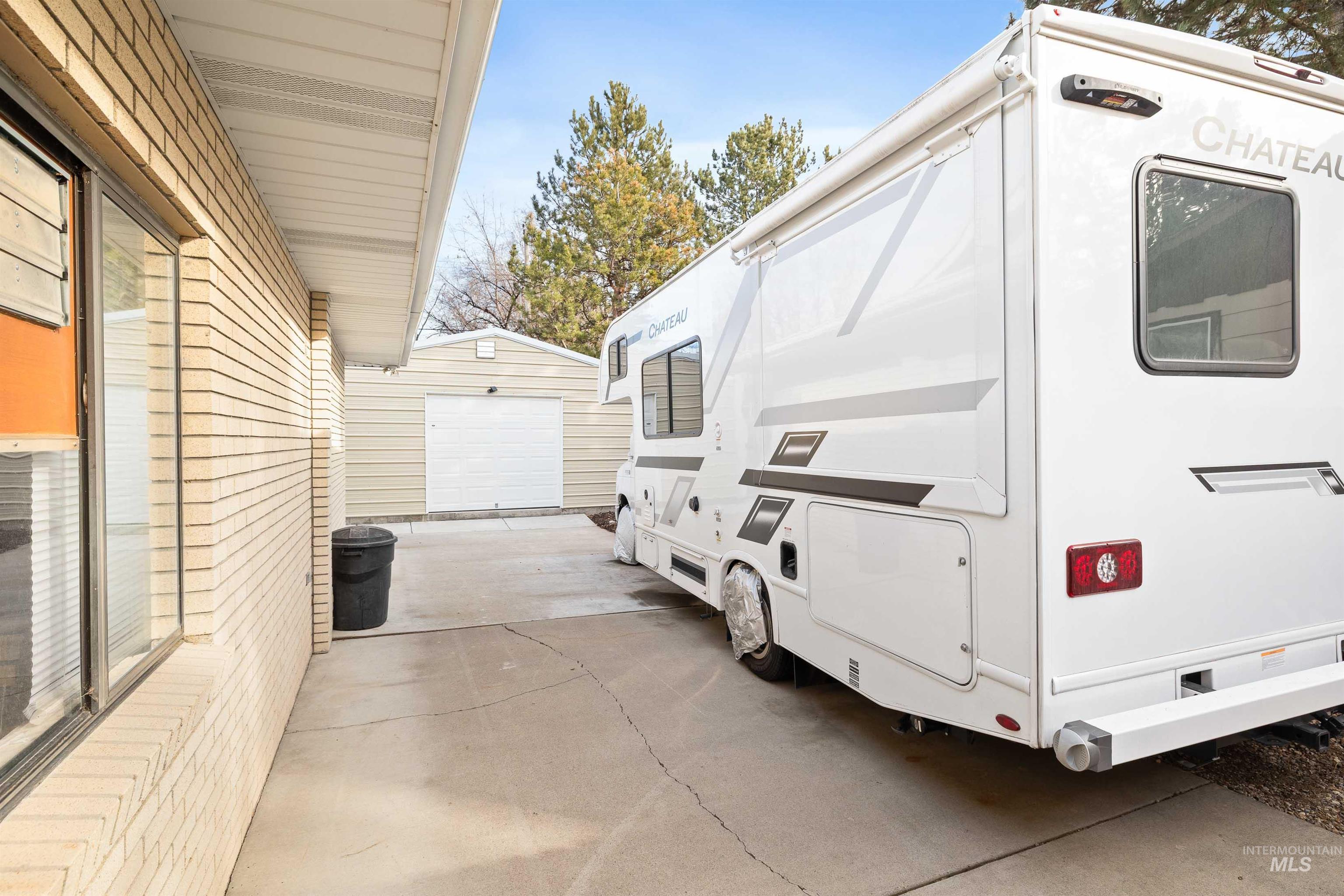 430 Pierce Street Twin Falls, ID 83301 - Photo 29 of 39 View of parking with a detached garage and concrete driveway