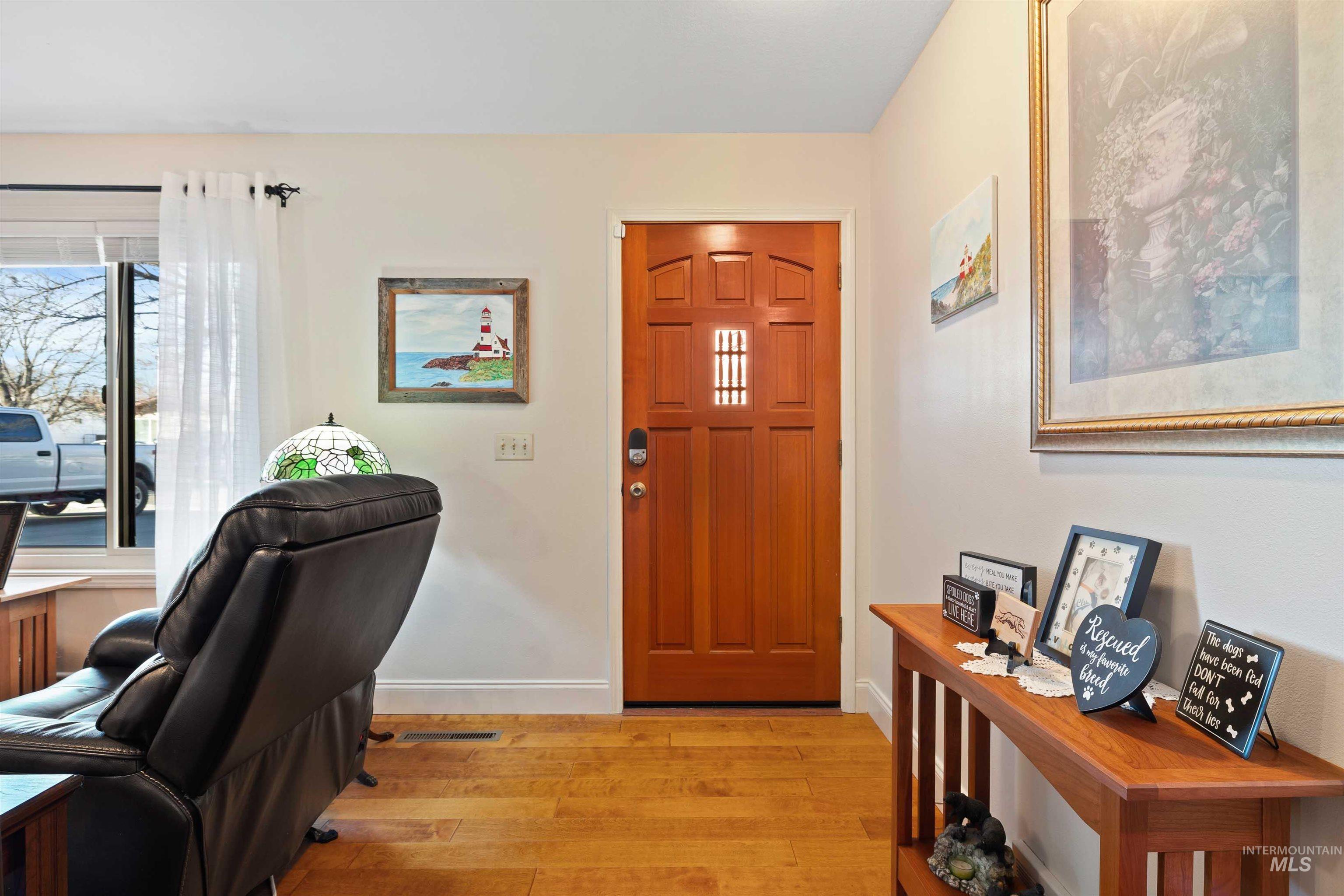 430 Pierce Street Twin Falls, ID 83301 - Photo 4 of 39 Entryway featuring light wood-type flooring and baseboards