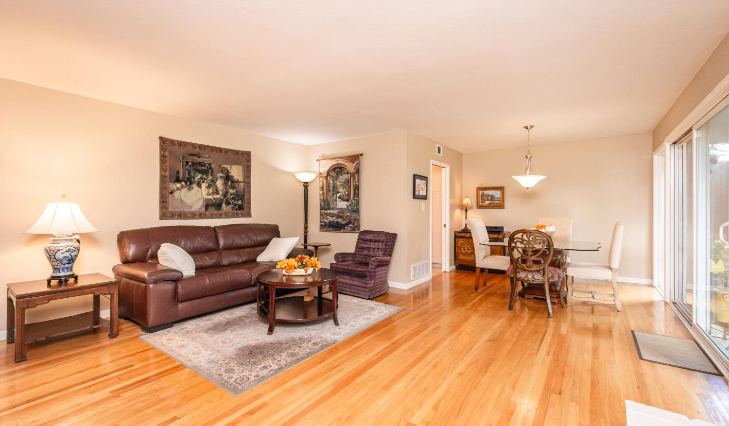 5310 Fort Sutter Way Sacramento, CA 95841 - Photo 13 of 55 a living room with furniture and a wooden floor