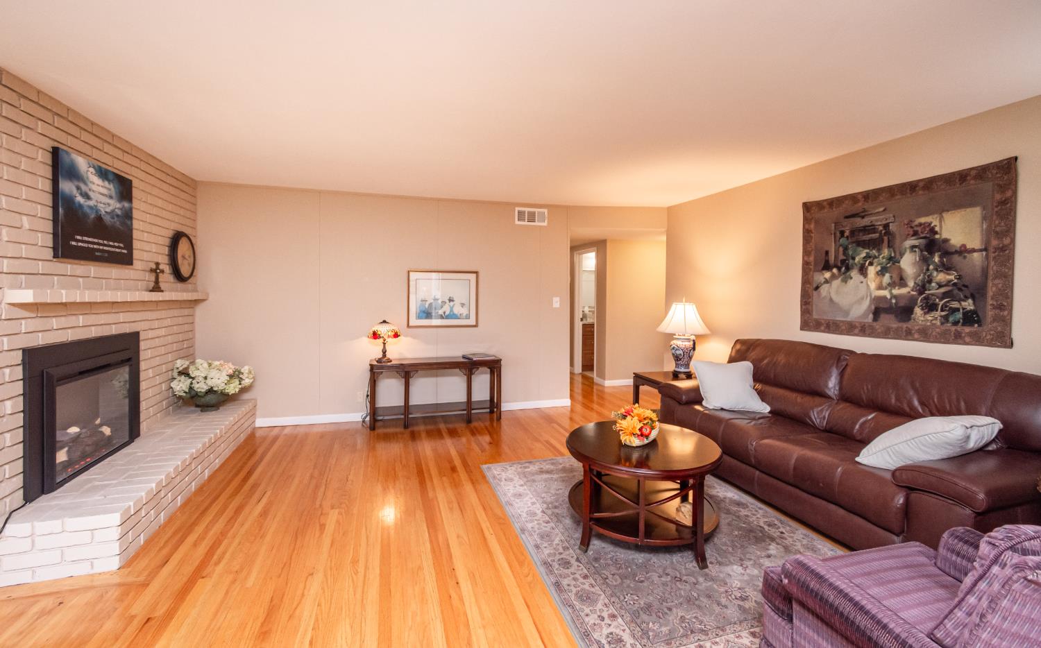 5310 Fort Sutter Way Sacramento, CA 95841 - Photo 14 of 55 a living room with furniture and a fireplace