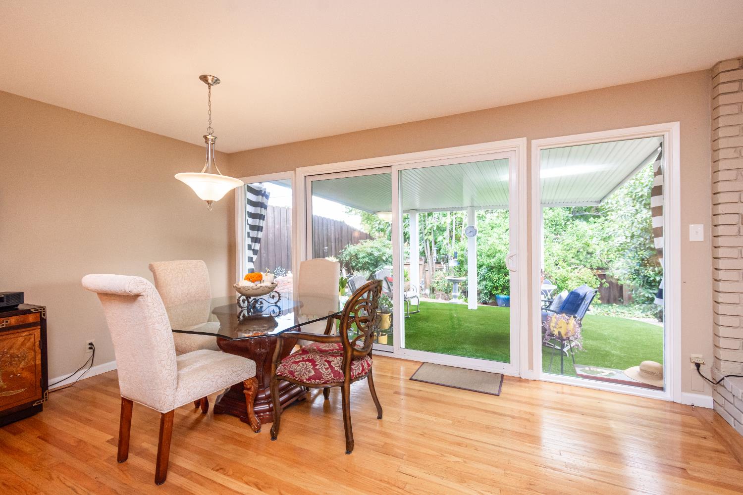 5310 Fort Sutter Way Sacramento, CA 95841 - Photo 18 of 55 a view of a dining room with furniture window and wooden floor