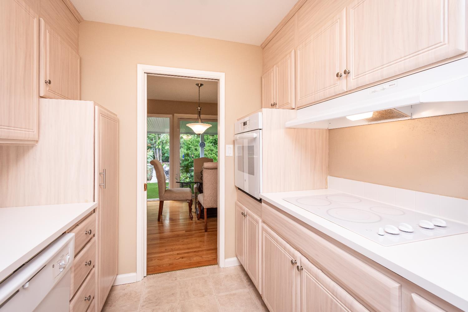 5310 Fort Sutter Way Sacramento, CA 95841 - Photo 22 of 55 a kitchen with a refrigerator and a sink