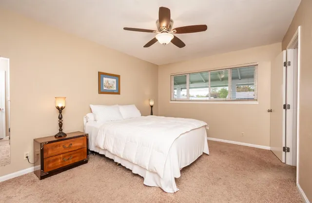 a workspace with furniture and a window