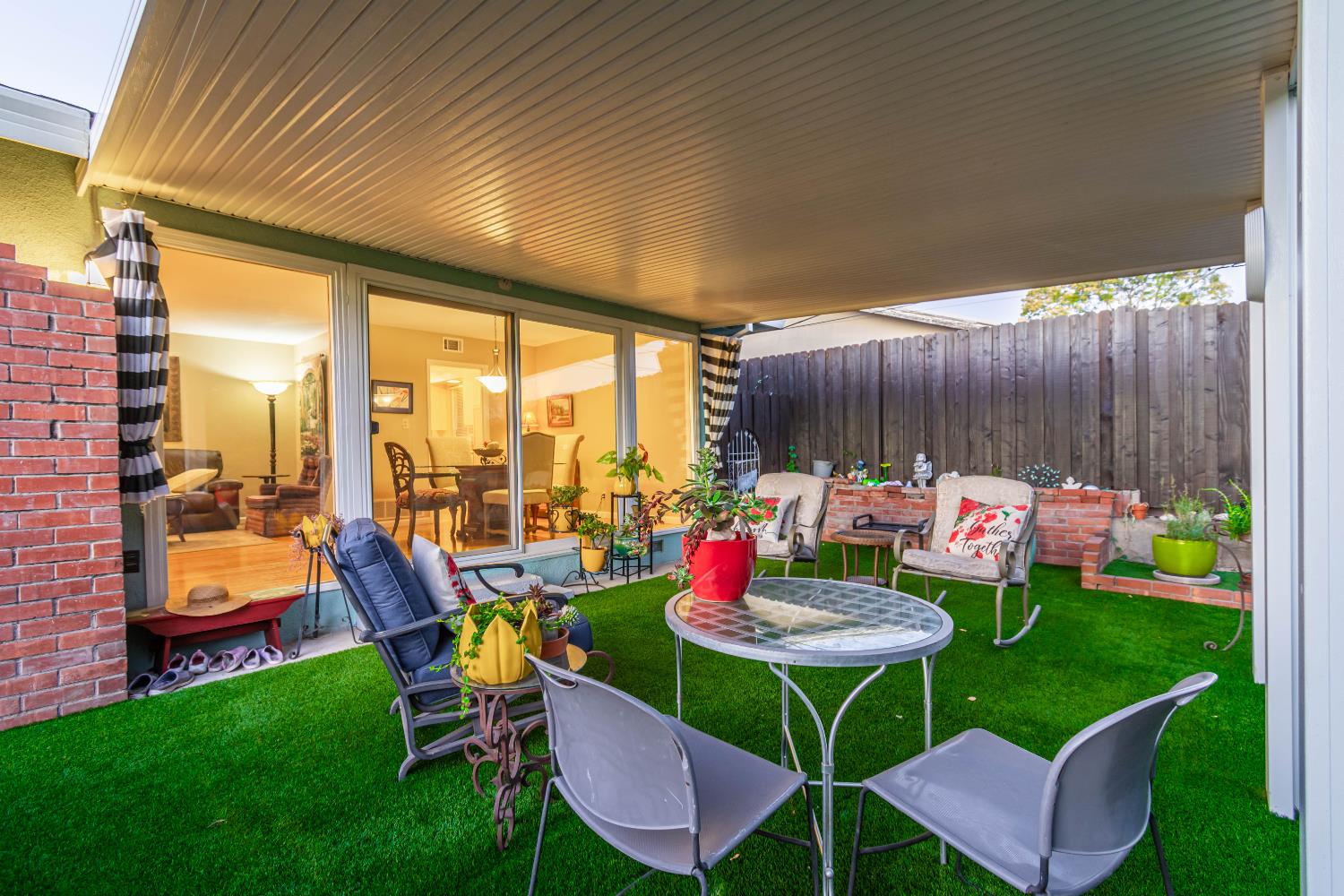 5310 Fort Sutter Way Sacramento, CA 95841 - Photo 42 of 55 a backyard of a house with a table and chairs