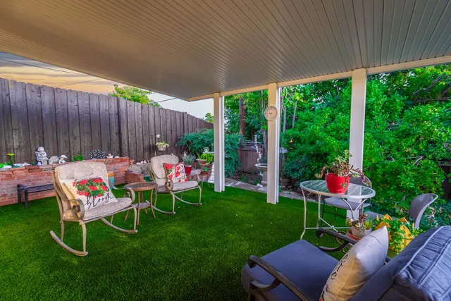 a view of a house with garden and plants