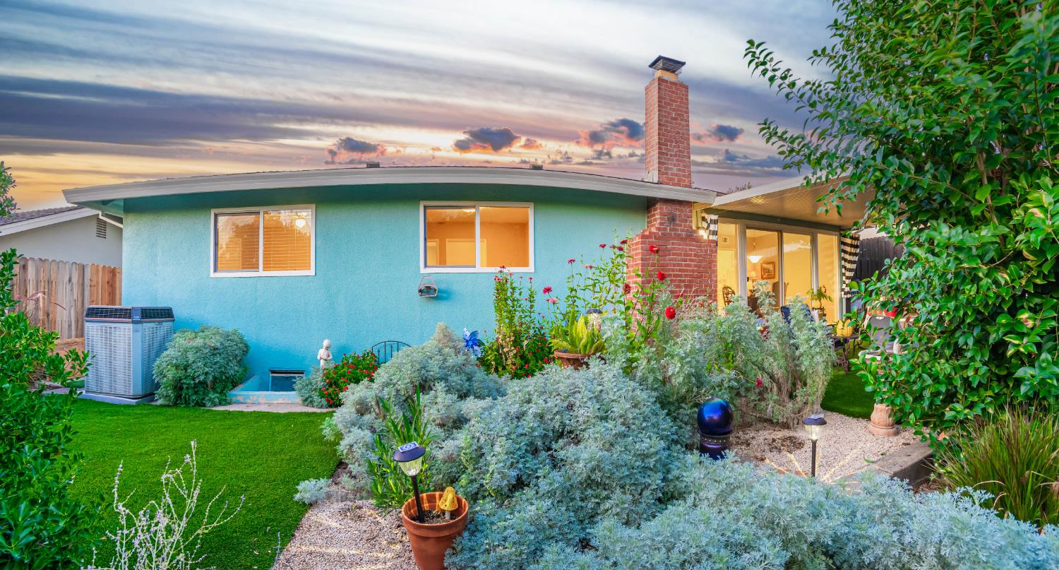 5310 Fort Sutter Way Sacramento, CA 95841 - Photo 46 of 55 a front view of a house with garden