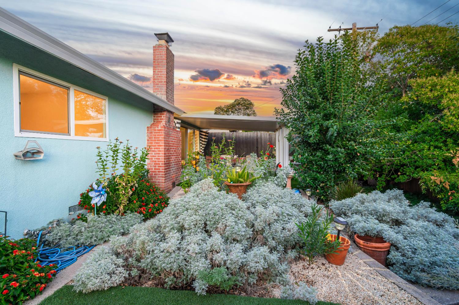 5310 Fort Sutter Way Sacramento, CA 95841 - Photo 49 of 55 a house view with a garden space