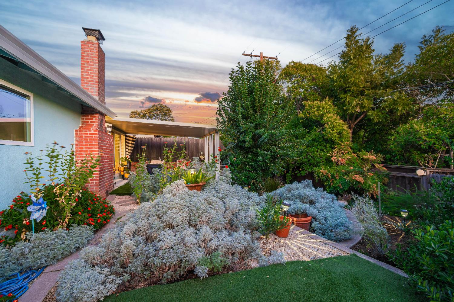 5310 Fort Sutter Way Sacramento, CA 95841 - Photo 50 of 55 a view of a house with garden and plants