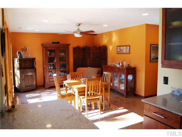 3919 Swarthmore Road Durham, NC 27707 - Photo 6 of 24 Family room offers plenty of room for seating and a breakfast table. Conrete floors in family room, powder room and kitchen tie the space together. Den/Family/Great Room