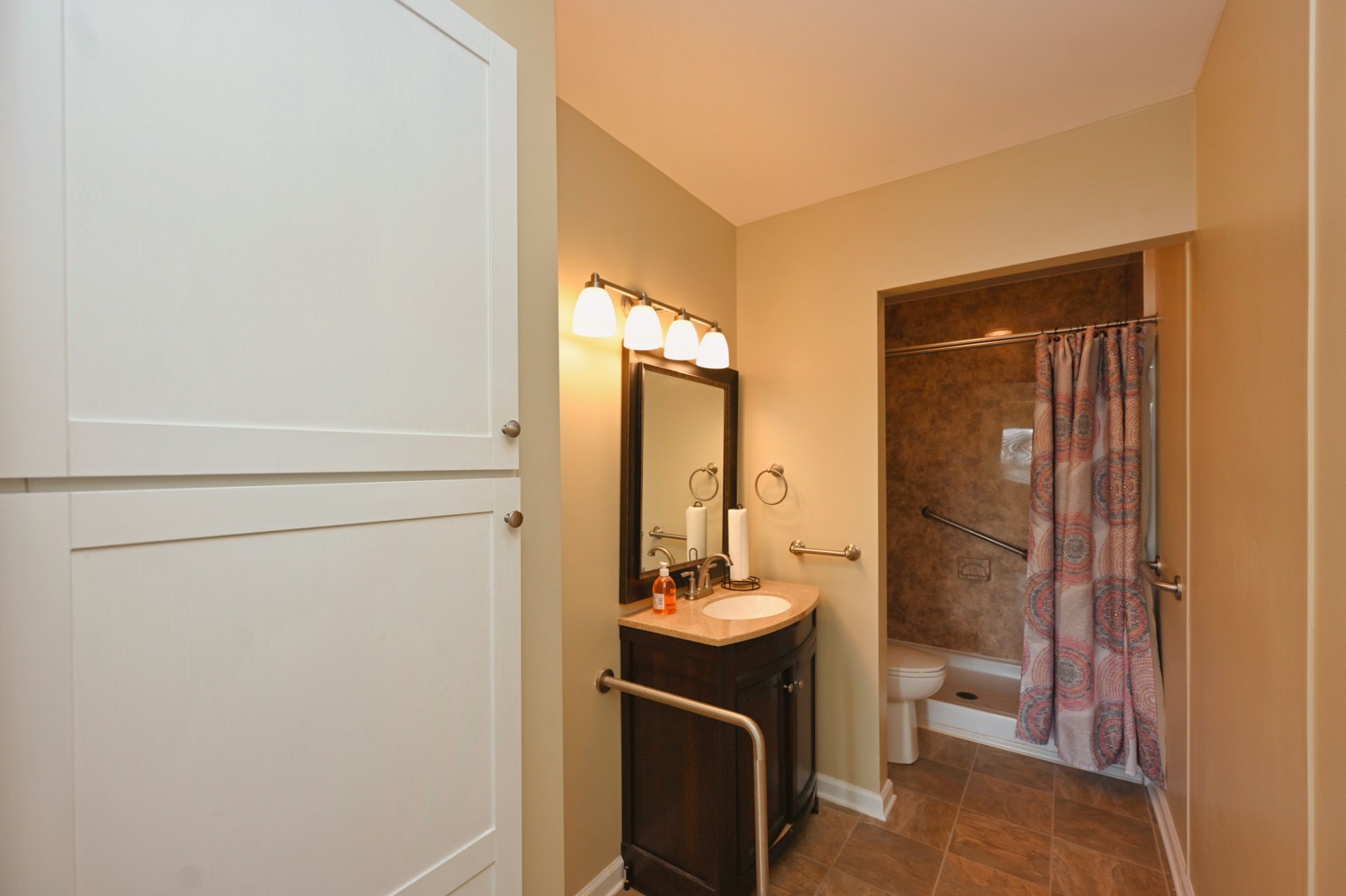 200 Sanders Ferry Road, Unit 2307 Hendersonville, TN 37075 - Photo 14 of 29 a bathroom with a sink a toilet and shower