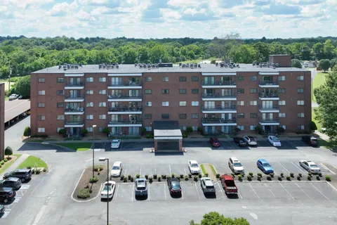 an aerial view of residential house with outdoor space