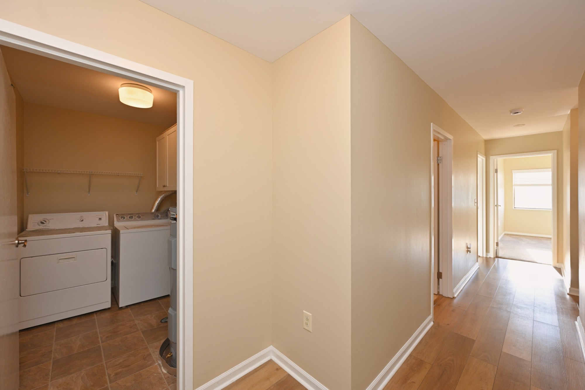 200 Sanders Ferry Road, Unit 2307 Hendersonville, TN 37075 - Photo 3 of 29 a view of a hallway to rooms and wooden floor