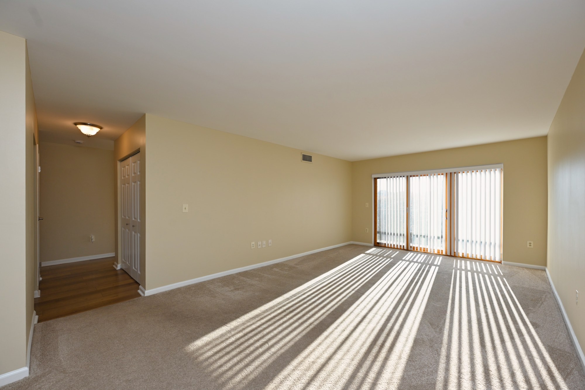 200 Sanders Ferry Road, Unit 2307 Hendersonville, TN 37075 - Photo 6 of 29 a view of an empty room with a window and wooden floor