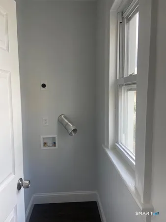 a view of small space with racks on the wall