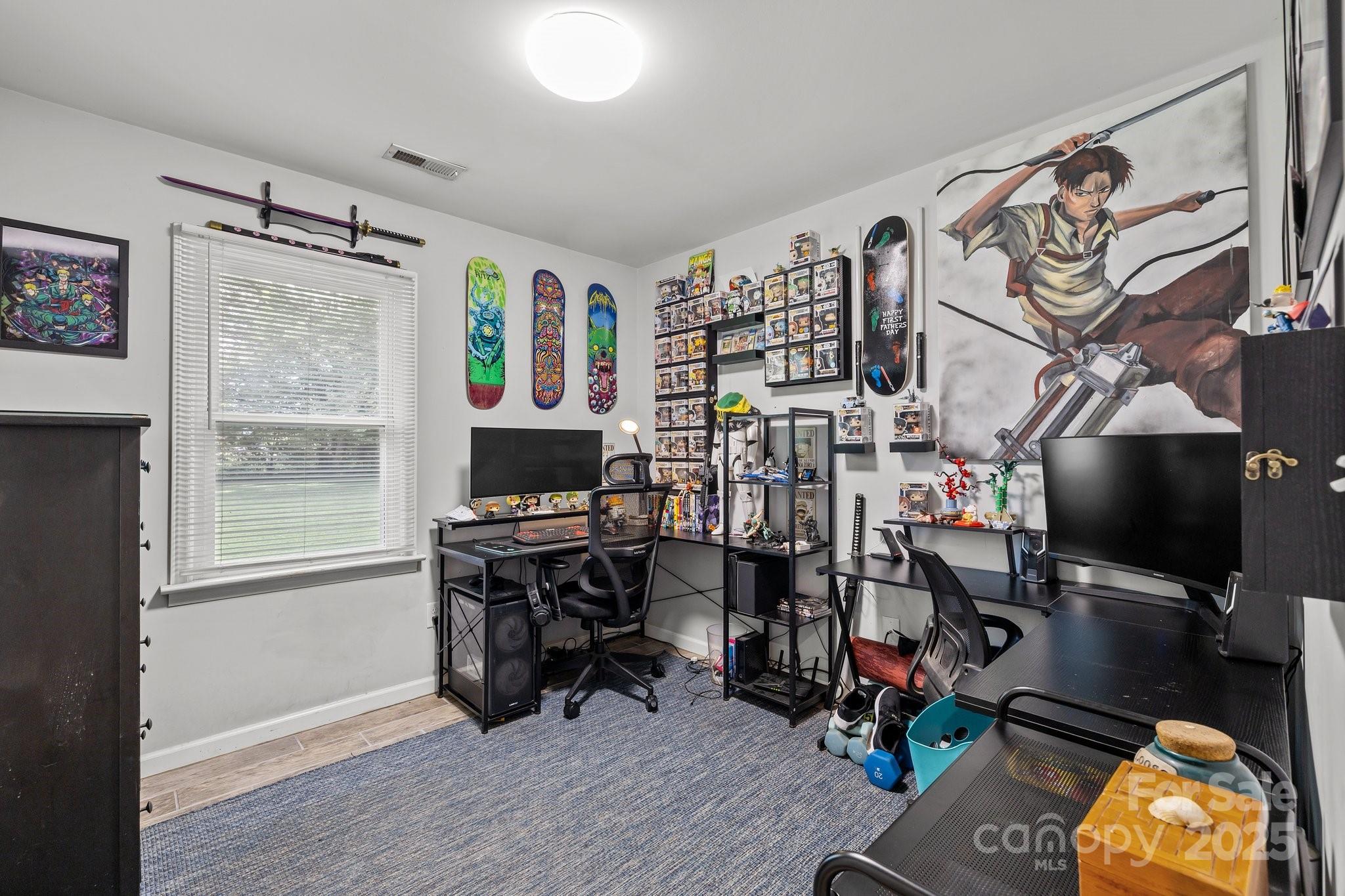 1108 Willoughby Road Monroe, NC 28110 - Photo 12 of 40 a view of a workspace with furniture and a window