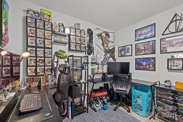 a view of a workspace with furniture