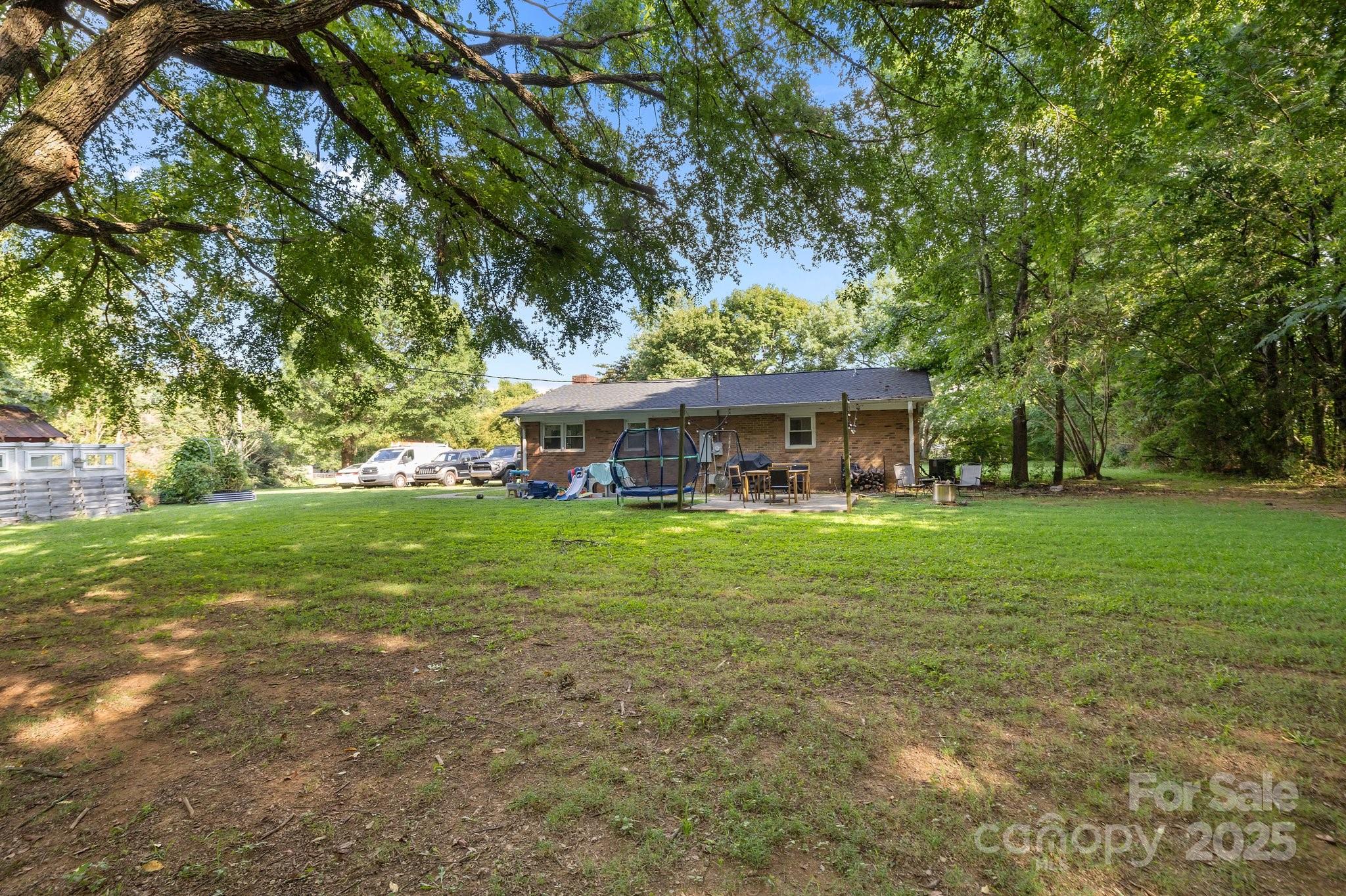 1108 Willoughby Road Monroe, NC 28110 - Photo 21 of 40 a front view of a house with a yard