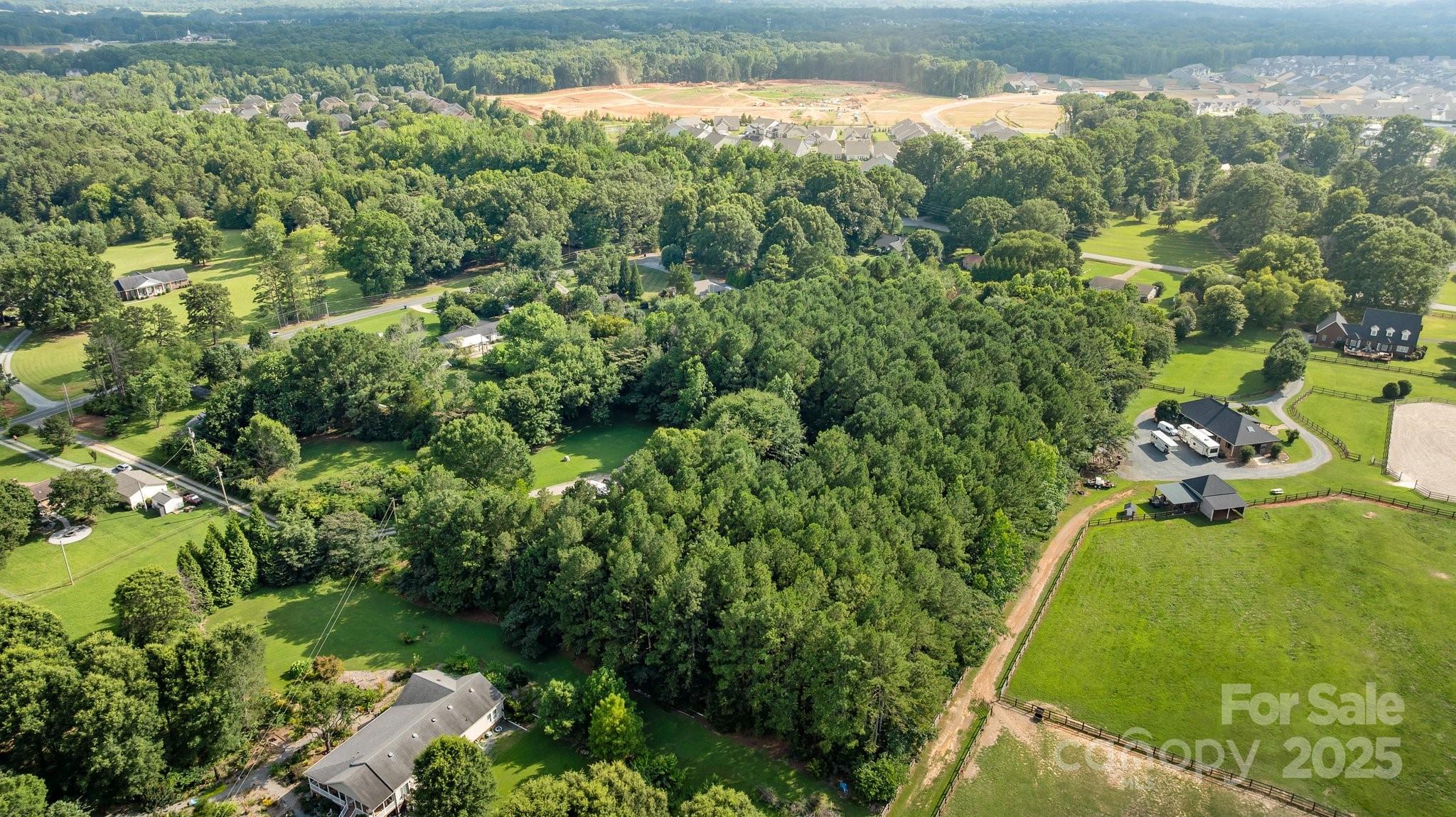 1108 Willoughby Road Monroe, NC 28110 - Photo 32 of 40 a view of a yard with plants