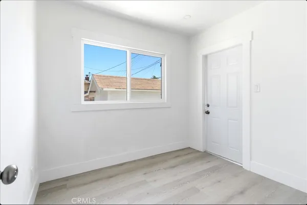a view of a porch with wooden floor