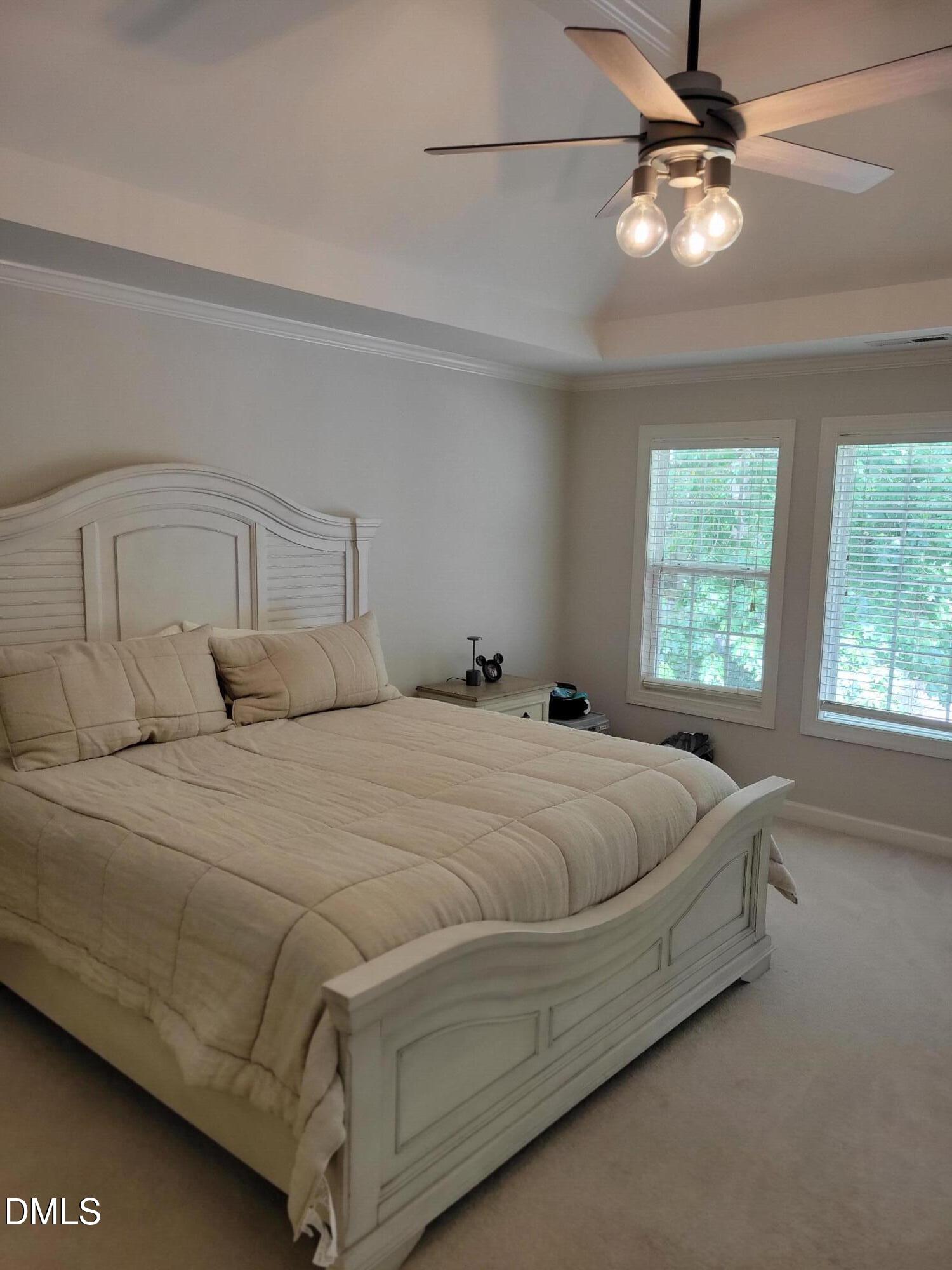 4044 Barton Park Place Raleigh, NC 27613 - Photo 16 of 20 a bedroom with a bed and window