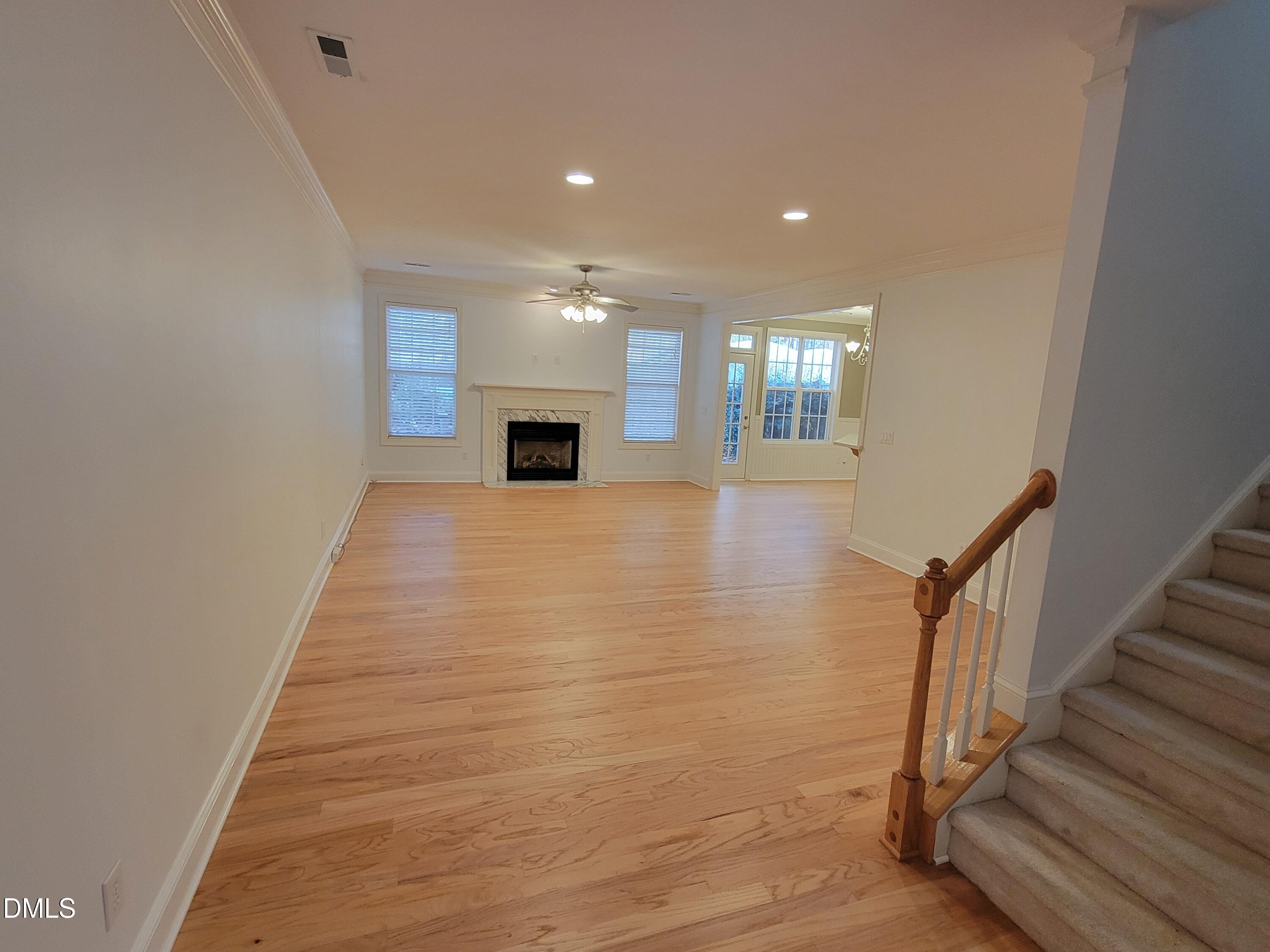 4044 Barton Park Place Raleigh, NC 27613 - Photo 3 of 20 a view of entryway and hall with wooden floor