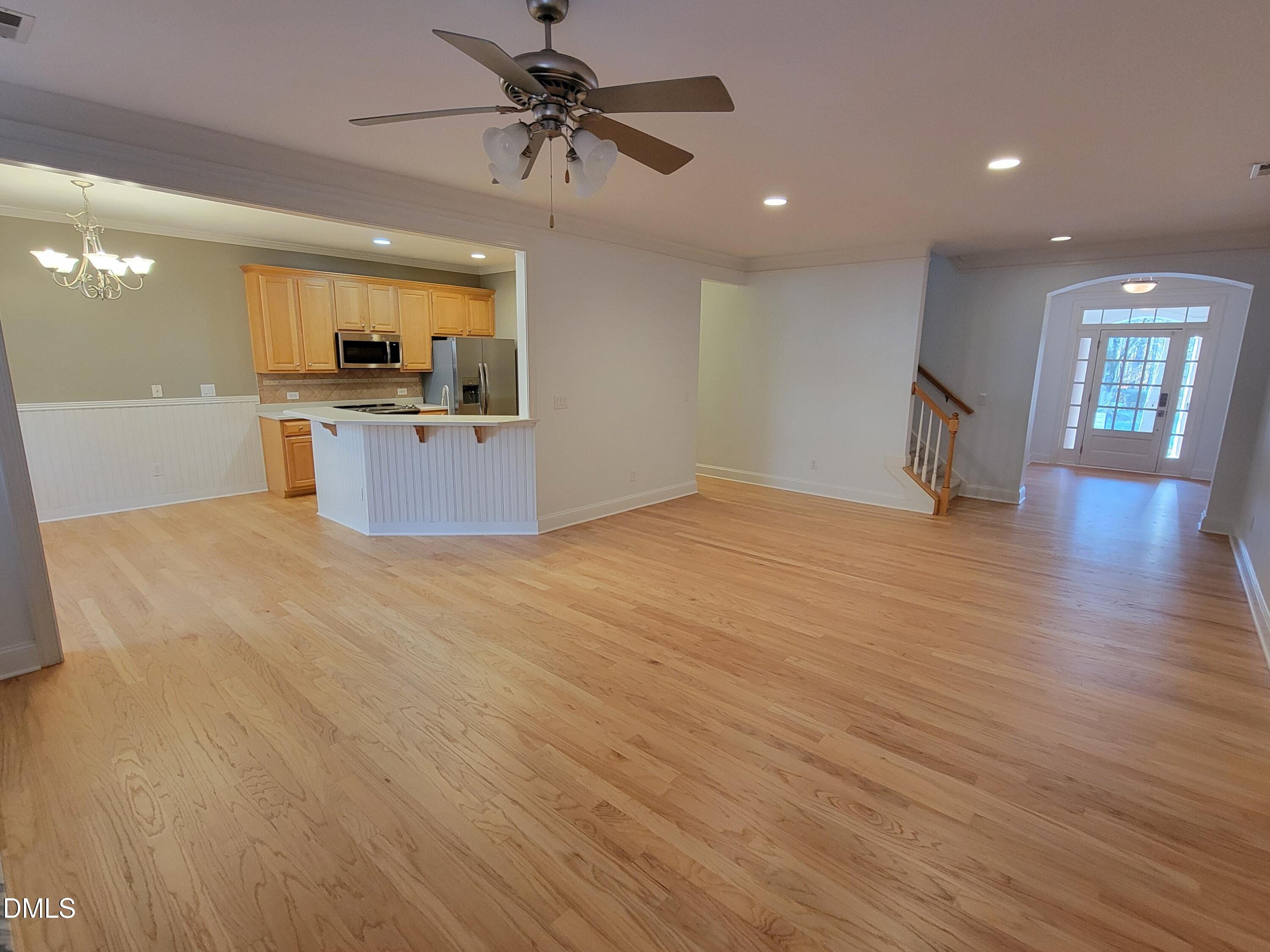 4044 Barton Park Place Raleigh, NC 27613 - Photo 5 of 20 a view of kitchen with cabinets and wooden floor