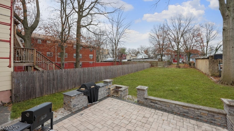 157 West 2nd Avenue Roselle, NJ 07203 - Photo 16 of 19 a view of a backyard with sitting area