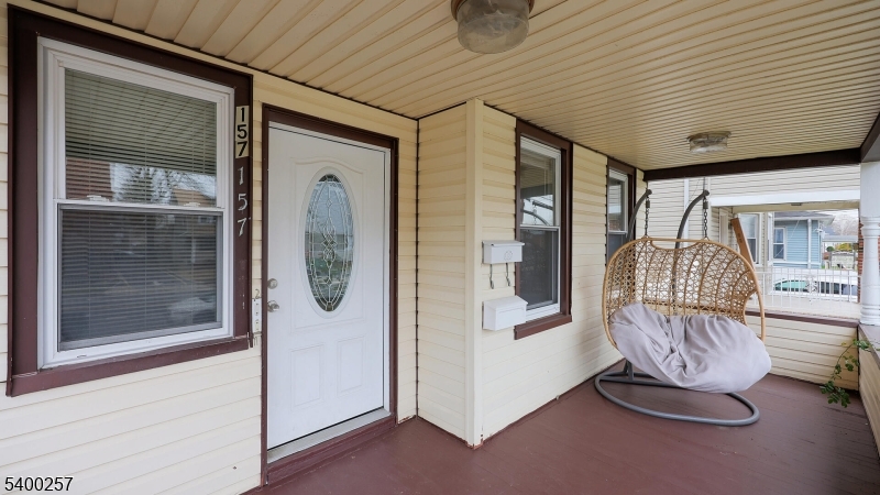 157 West 2nd Avenue Roselle, NJ 07203 - Photo 2 of 19 a view of front door with furniture