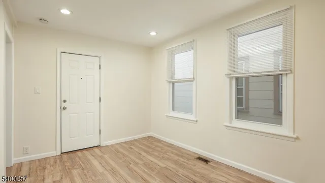 an empty room with windows