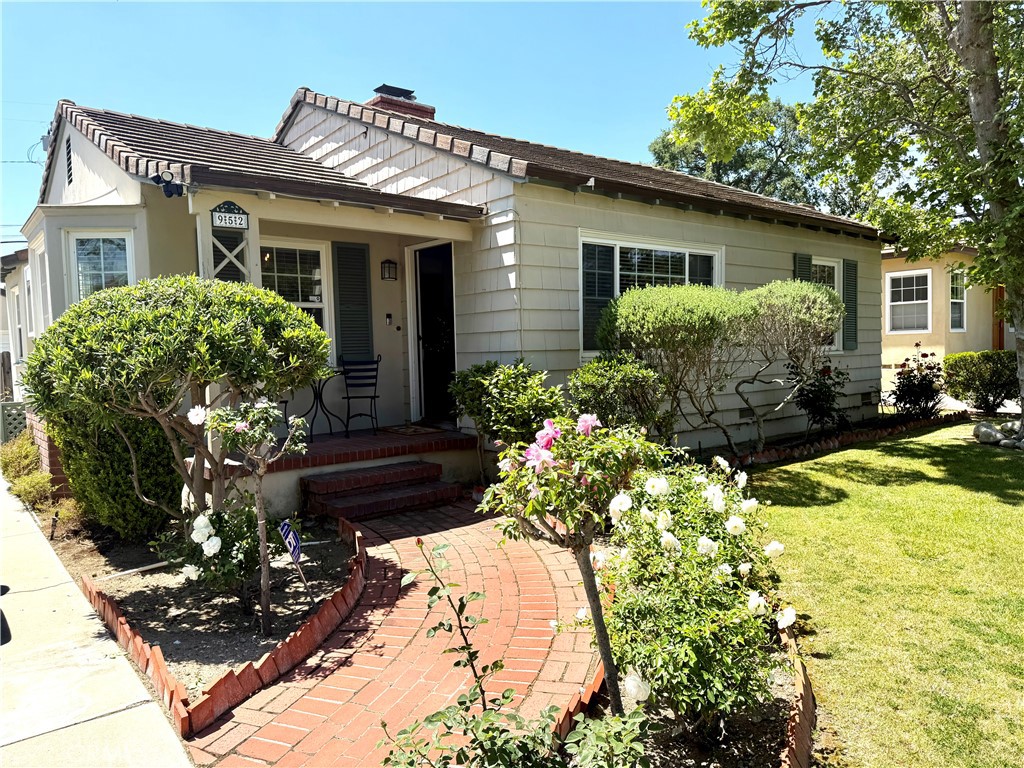 952 Balboa Drive Arcadia, CA 91007 - Photo 3 of 29 a front view of a house with a yard