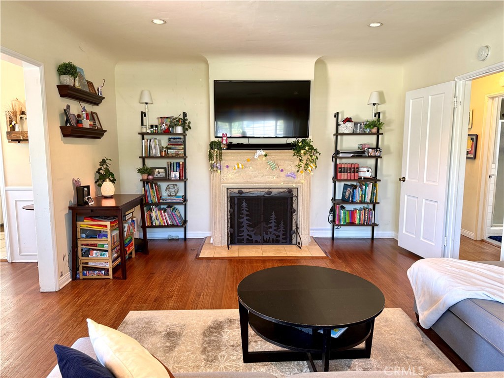 952 Balboa Drive Arcadia, CA 91007 - Photo 6 of 29 a living room with furniture and a flat screen tv