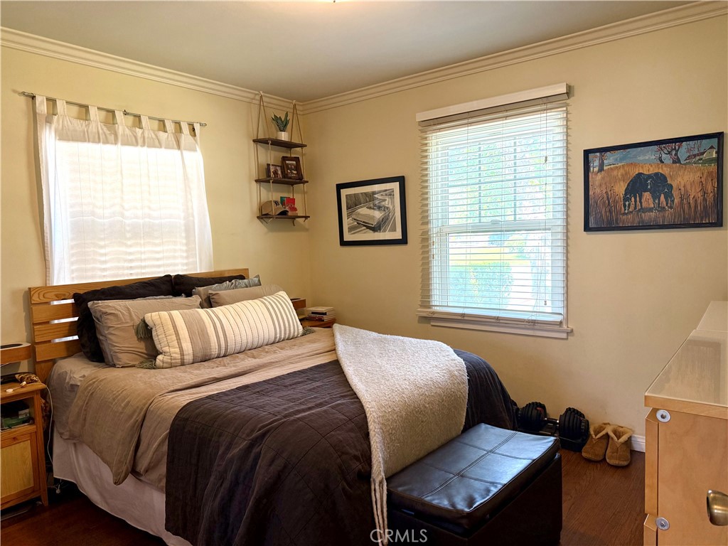 952 Balboa Drive Arcadia, CA 91007 - Photo 8 of 29 a bedroom with a bed and wooden floor
