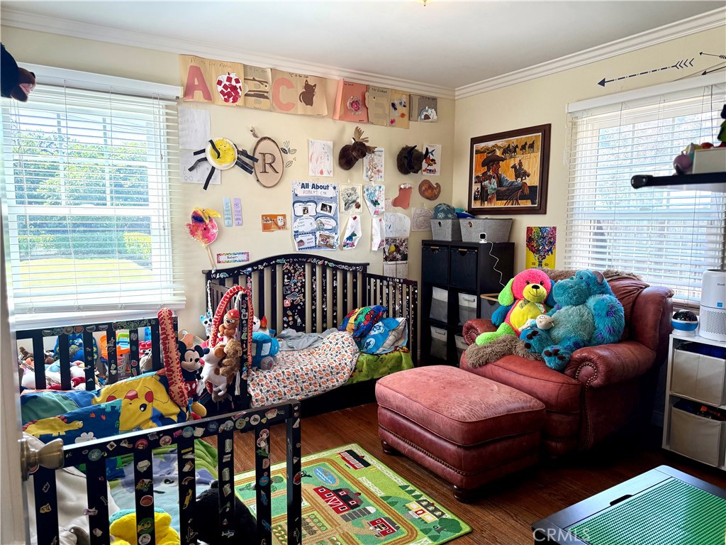 952 Balboa Drive Arcadia, CA 91007 - Photo 10 of 29 a bedroom with two beds and a book shelf