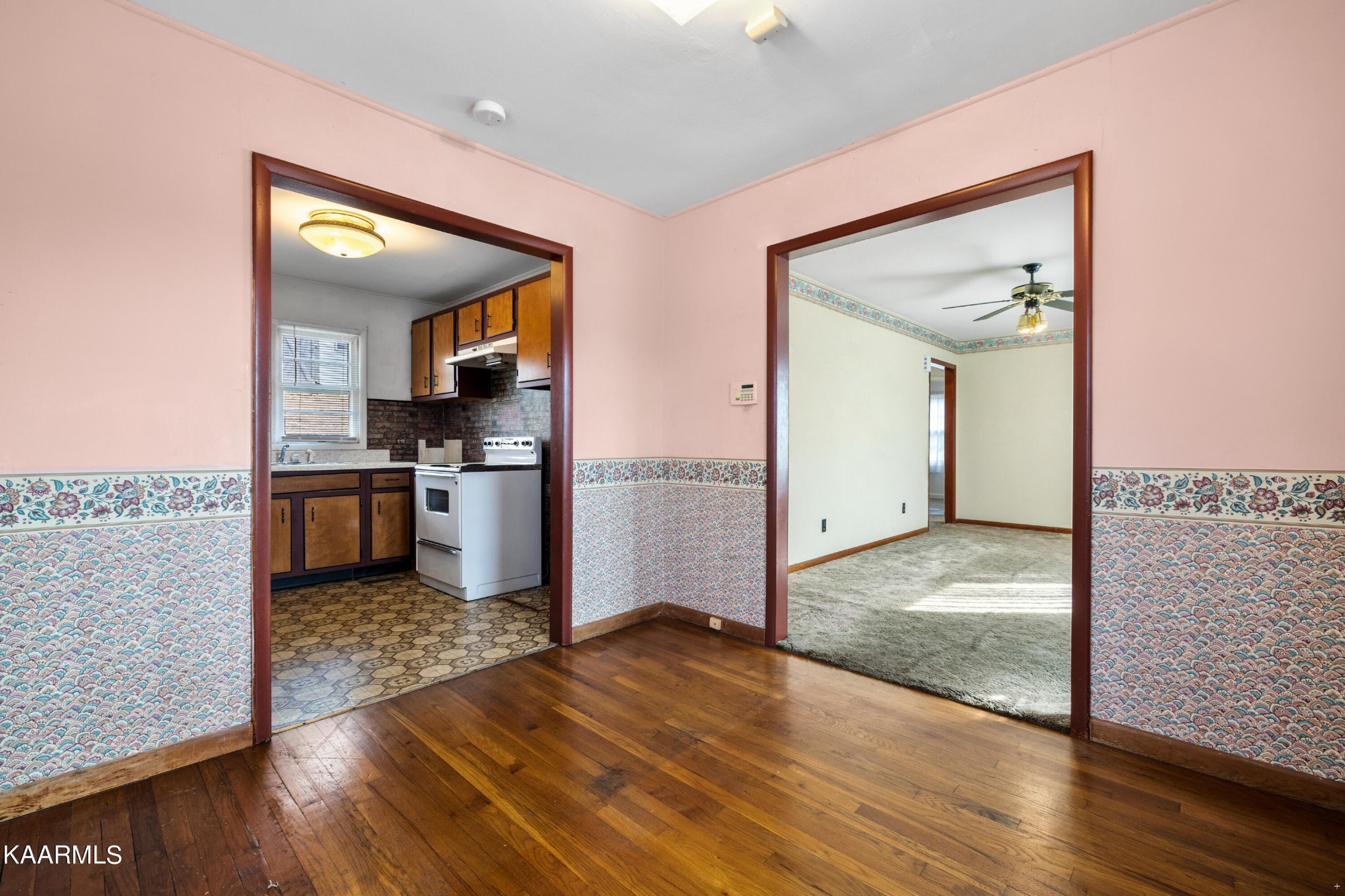 6701 Cate Road Powell, TN 37849 - Photo 12 of 18 a view of a kitchen with wooden floor and a kitchen