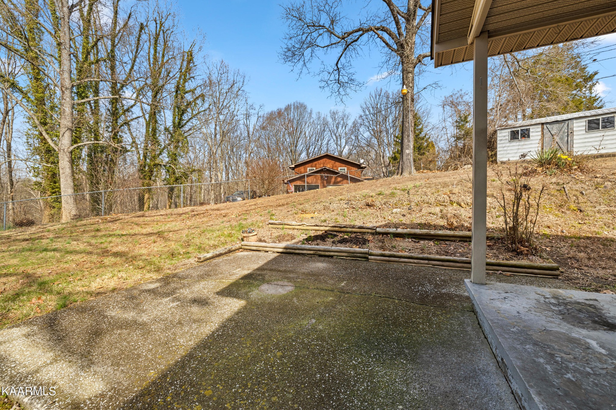 6701 Cate Road Powell, TN 37849 - Photo 18 of 18 a view of a yard with a tree