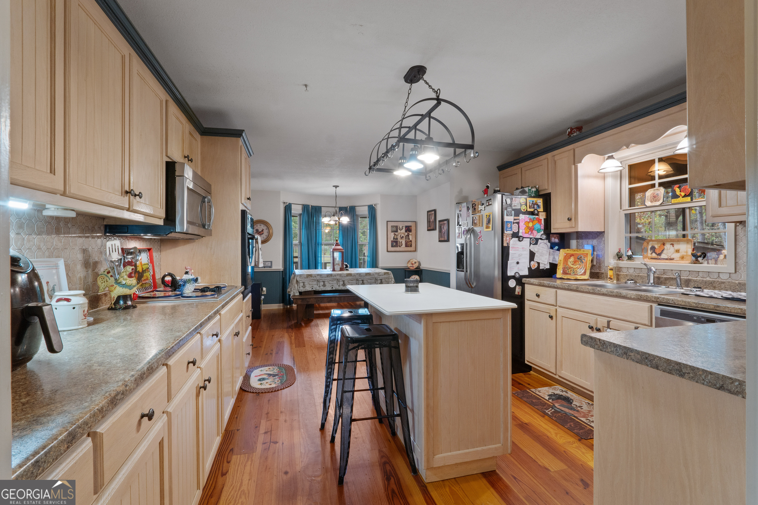 335 Gum Creek Road Roopville, GA 30170 - Photo 32 of 56 a kitchen that has a lot of cabinets in it