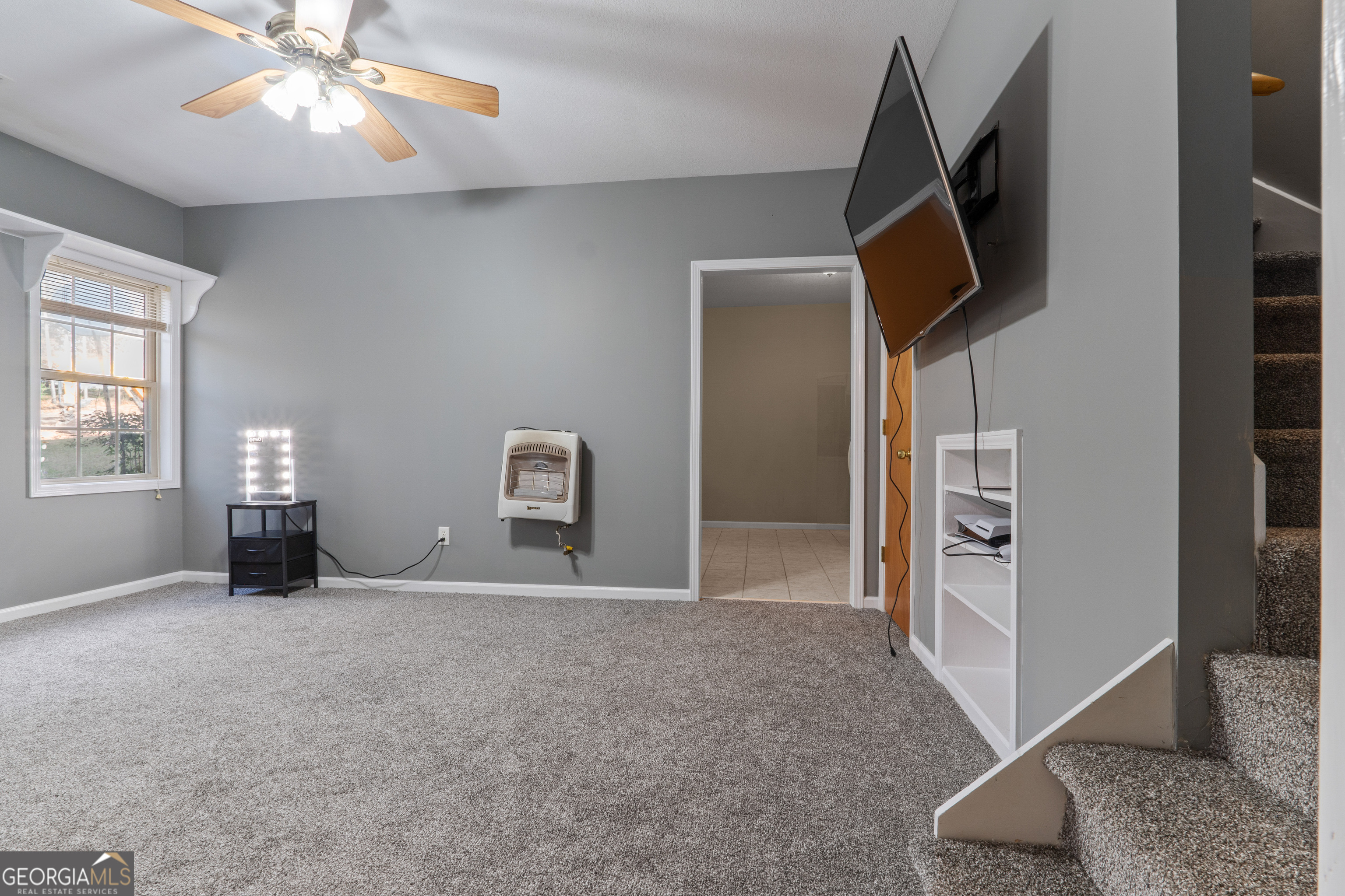335 Gum Creek Road Roopville, GA 30170 - Photo 40 of 56 an empty room with windows and fireplace