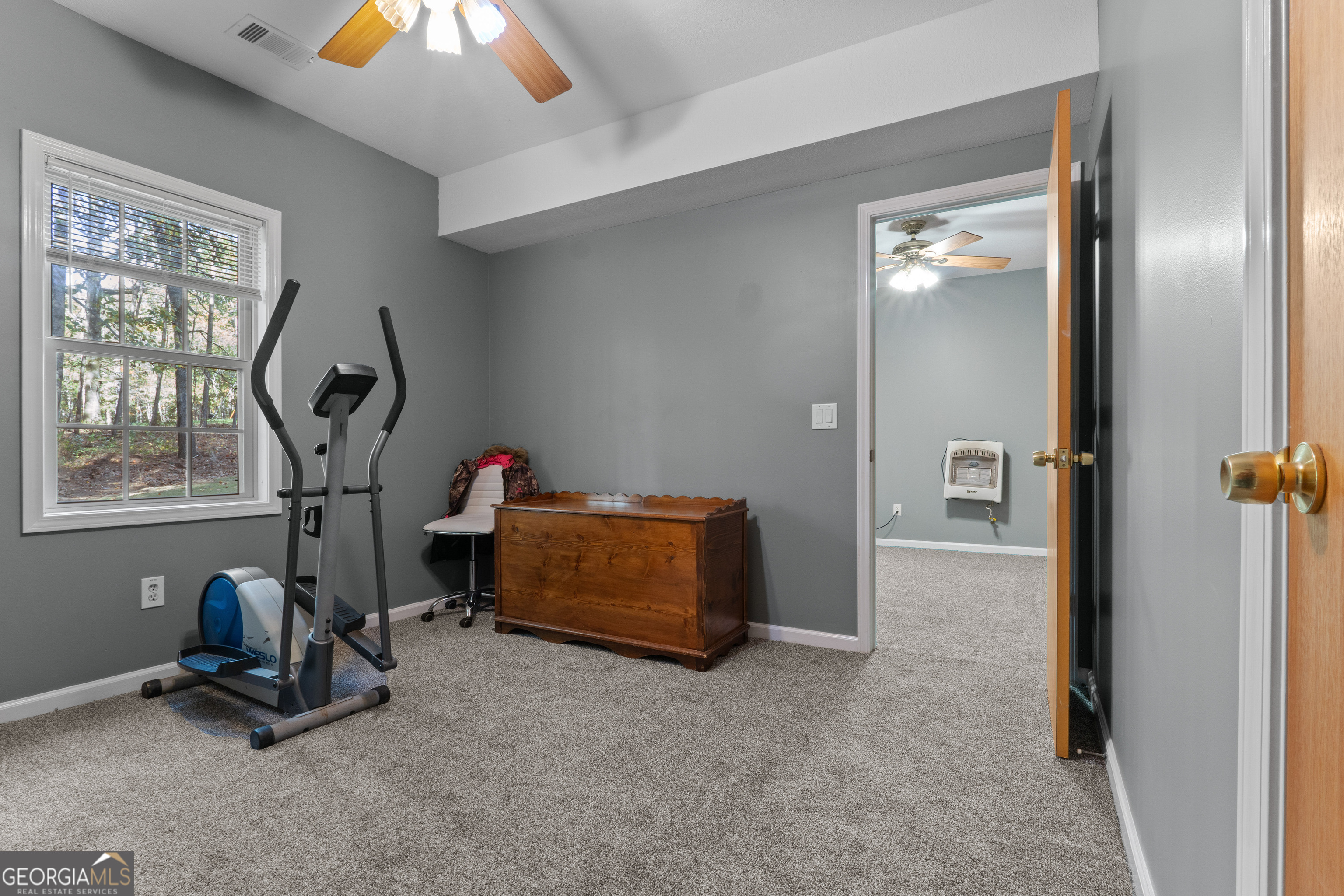 335 Gum Creek Road Roopville, GA 30170 - Photo 43 of 56 a view of a room with gym equipment