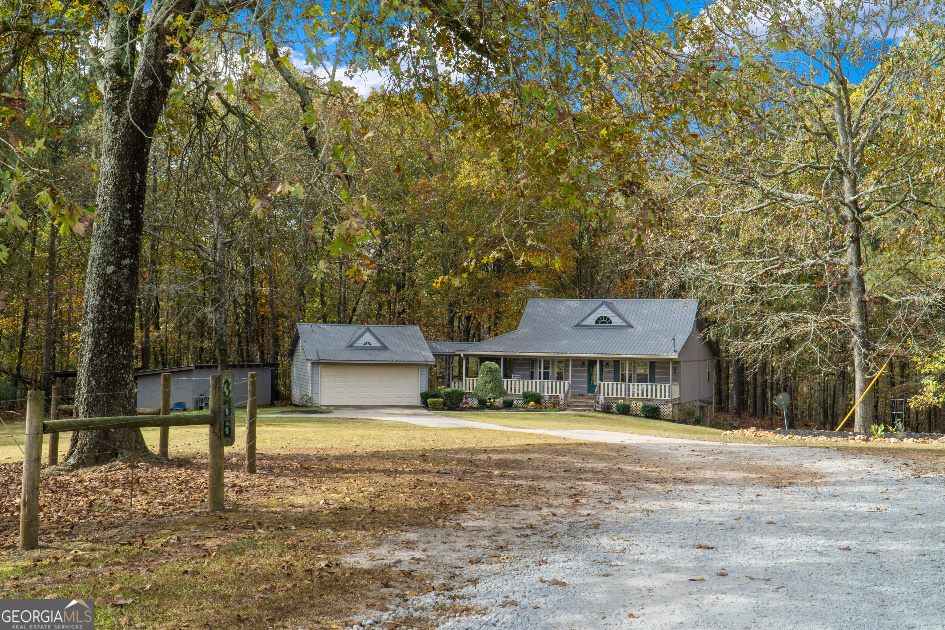 335 Gum Creek Road Roopville, GA 30170 - Photo 10 of 56 a front view of a house with a yard