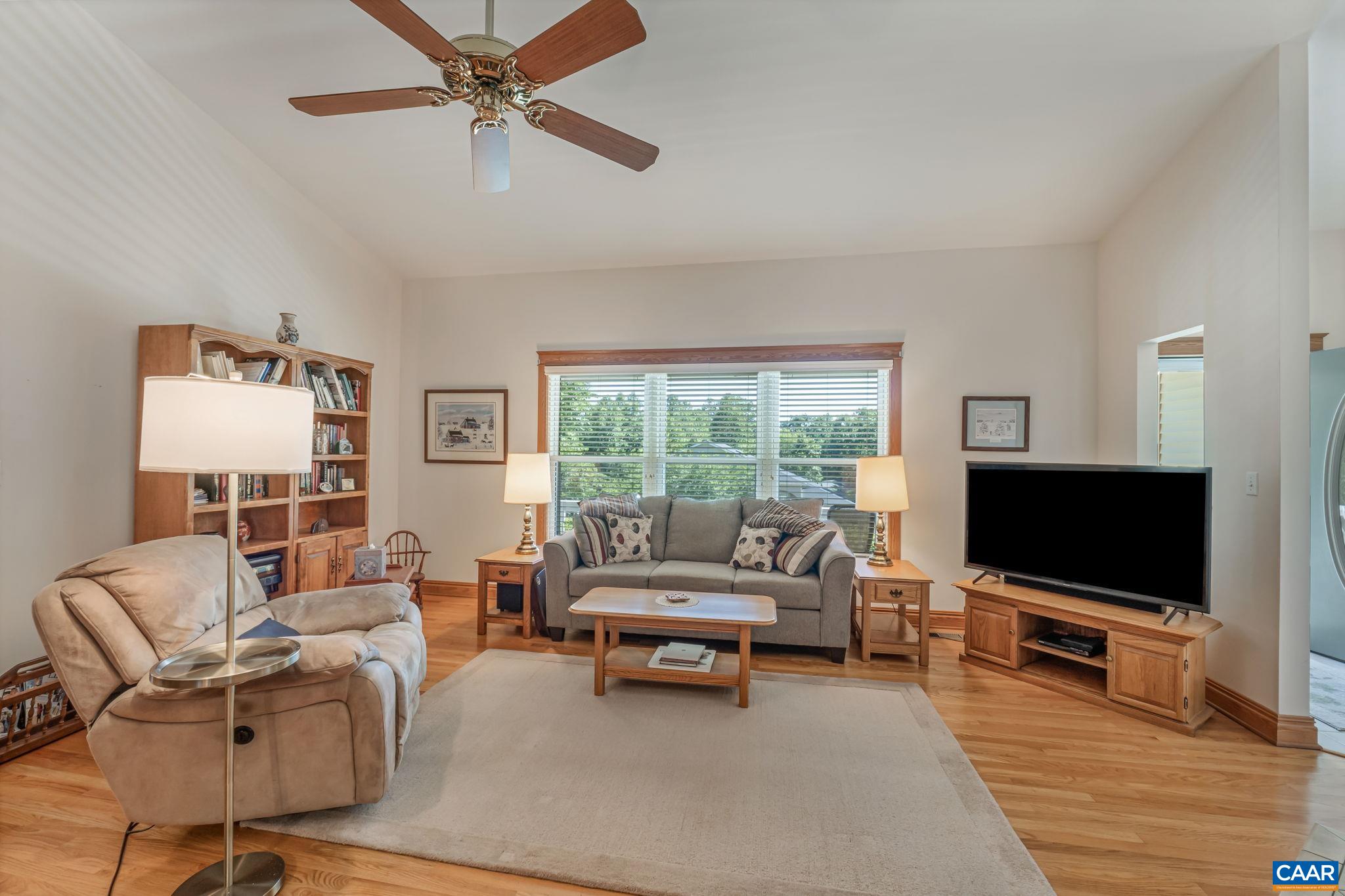 4 Ashton Road Palmyra, VA 22963 - Photo 13 of 34 a living room with furniture and a flat screen tv