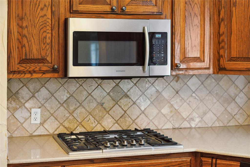 4104 Evergreen Drive Waco, TX 76708 - Photo 12 of 36 a stove top oven sitting inside of a kitchen
