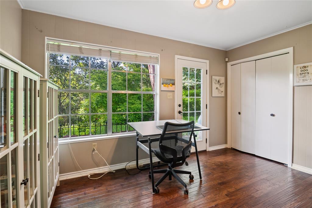 4104 Evergreen Drive Waco, TX 76708 - Photo 18 of 36 a workspace area with hardwood table and windows