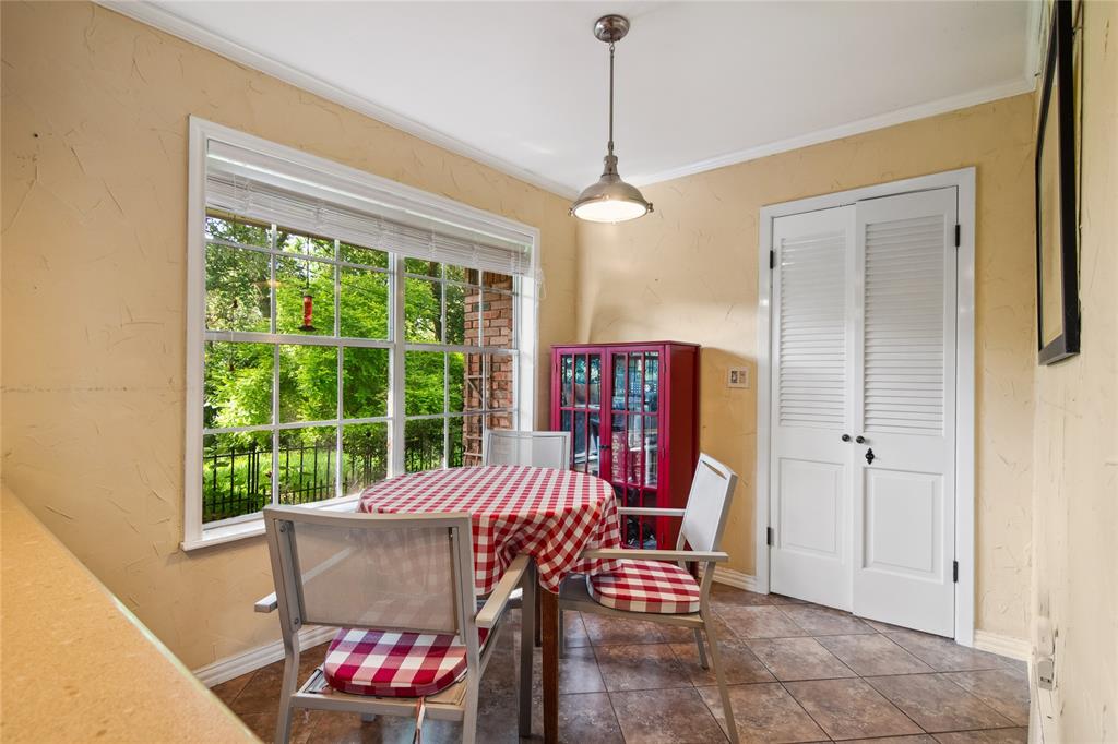 4104 Evergreen Drive Waco, TX 76708 - Photo 19 of 36 a view of a dining room with furniture window and outside view