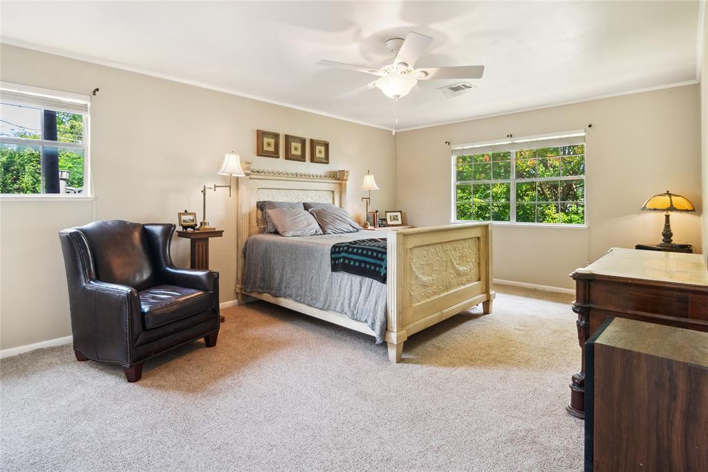 4104 Evergreen Drive Waco, TX 76708 - Photo 20 of 36 a bedroom with a bed couch and window