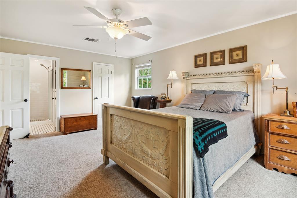 4104 Evergreen Drive Waco, TX 76708 - Photo 22 of 36 a living room with furniture and a flat screen tv