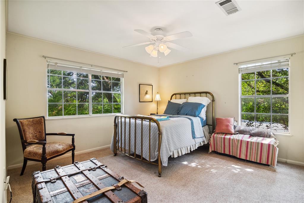 4104 Evergreen Drive Waco, TX 76708 - Photo 23 of 36 a bedroom with a bed and a window
